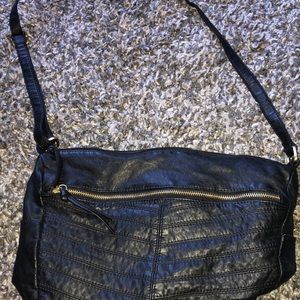 used once, 3 zip up pockets, one on the inside 2 on the outside